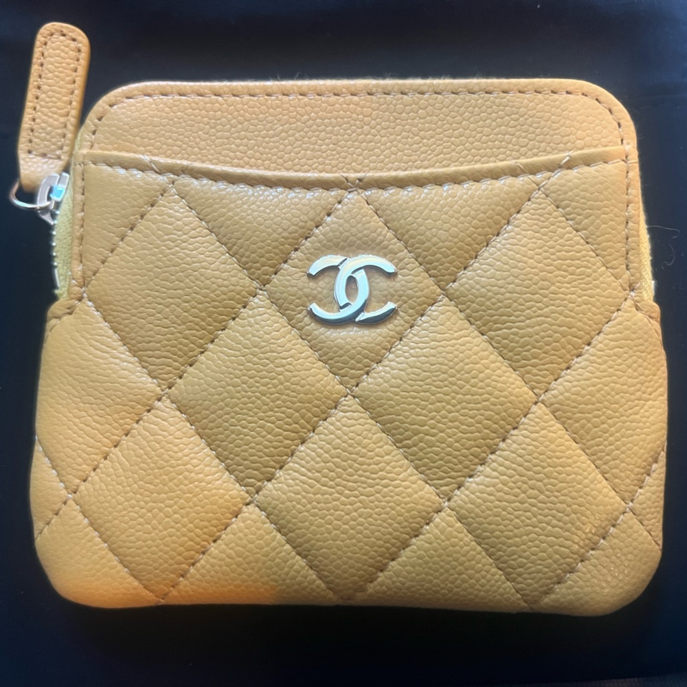 Brand new Chanel yellow coin purse with tags, duster bag and original box